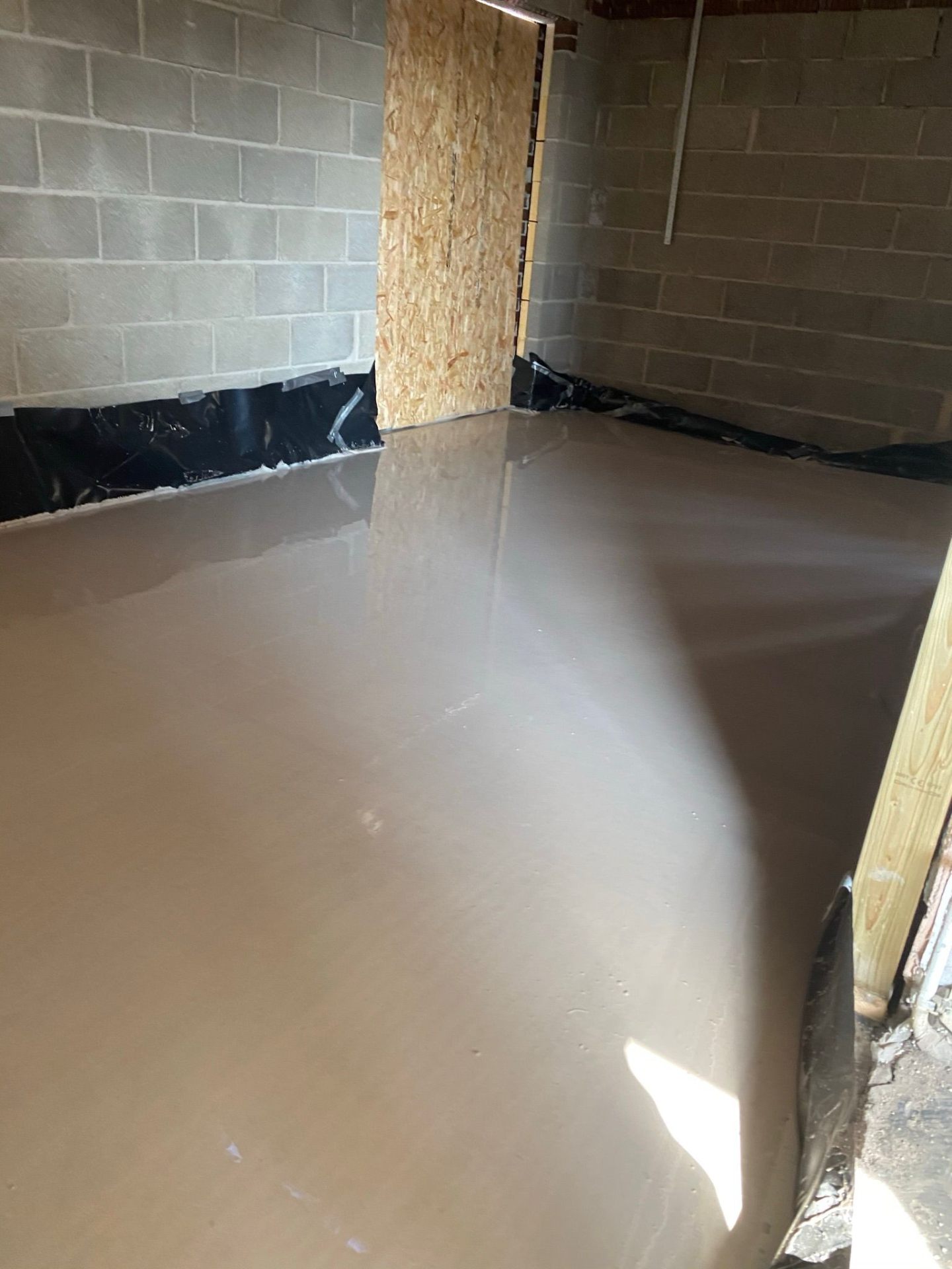 Substrate prepared and marked with depth gauges for pour