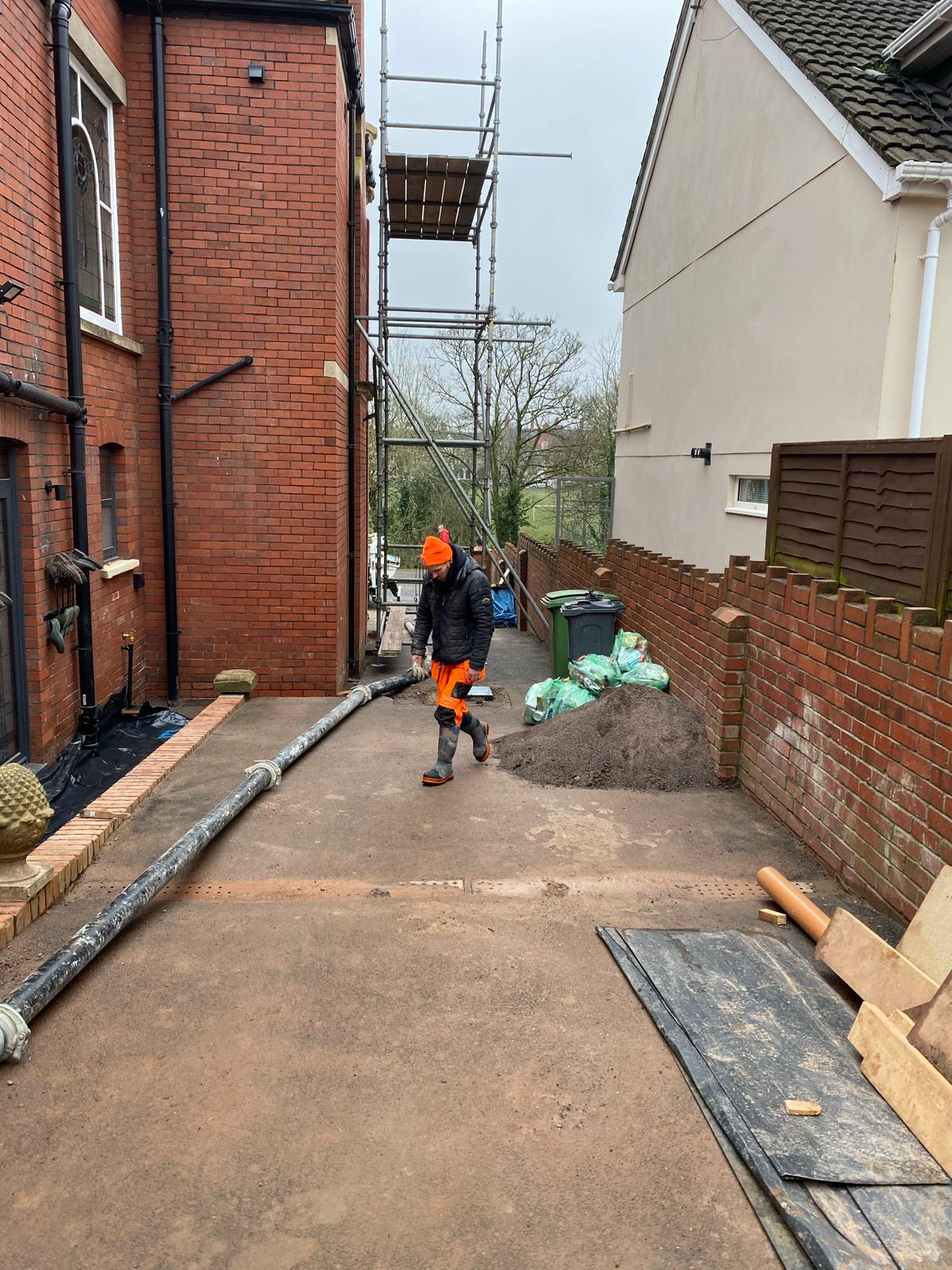Pumped concrete placed into formed foundations