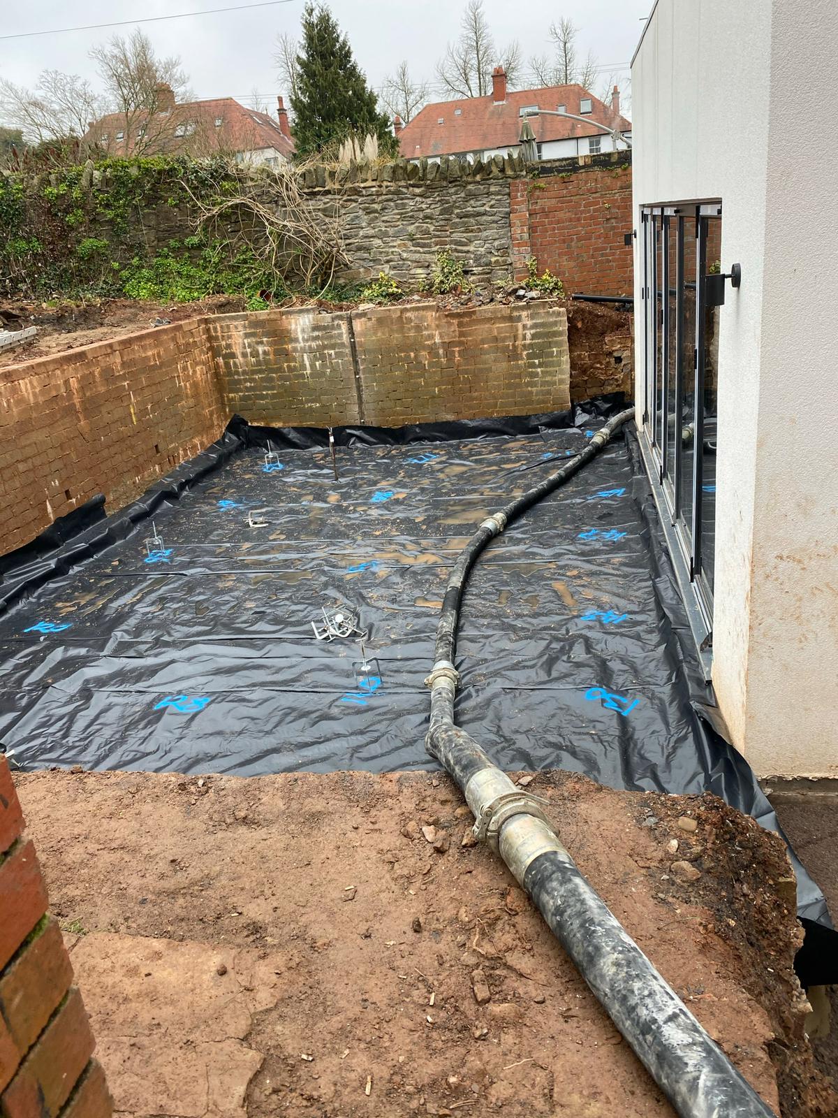 Pump set-up alongside ready-mix wagon for a continuous pour