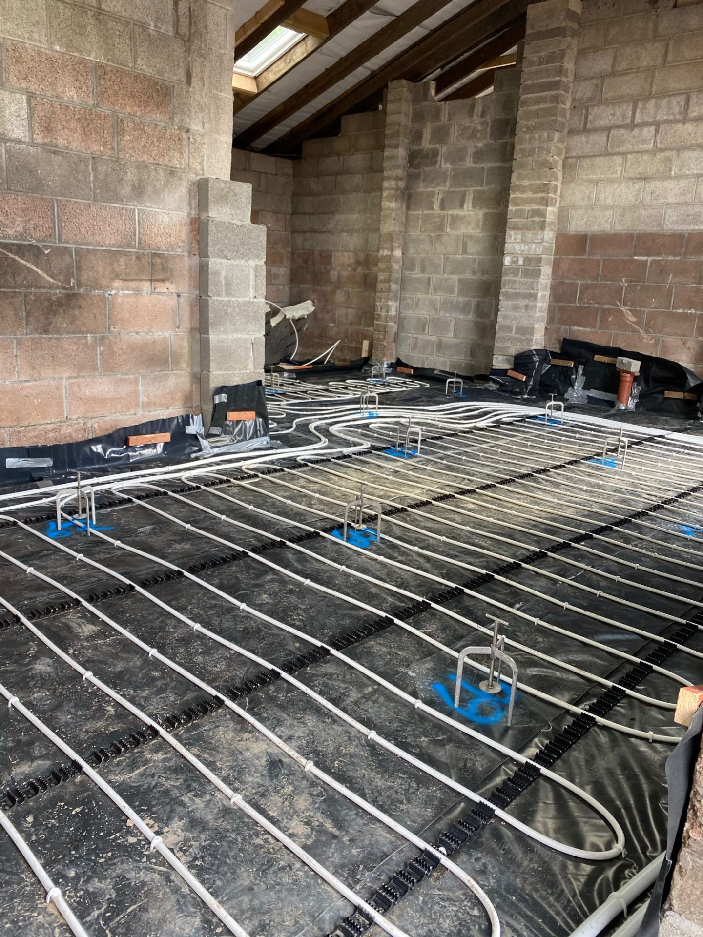 Floor preparation across a large open-plan extension