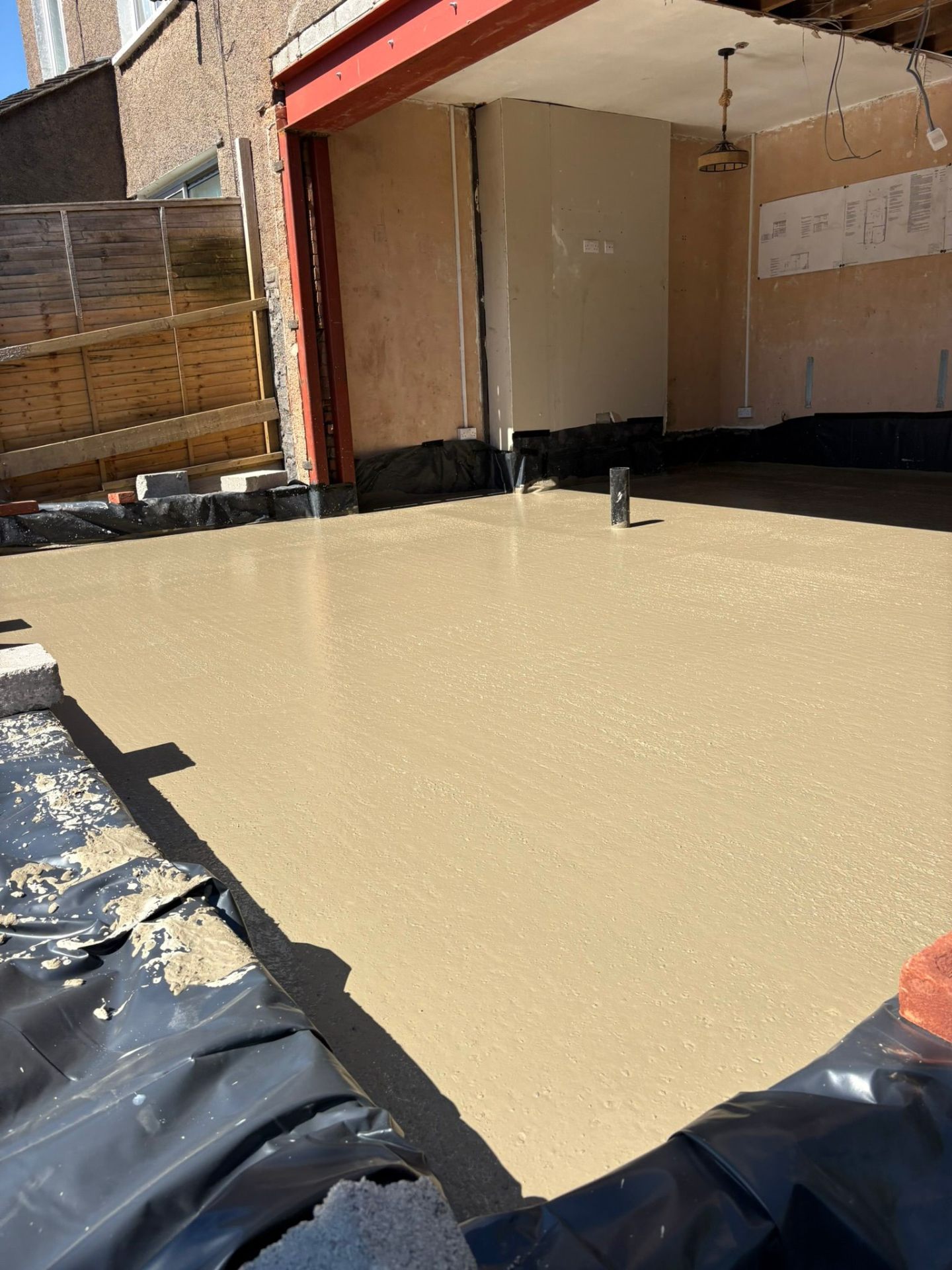 Pump and ready-mix wagon paired up for a kitchen extension pour