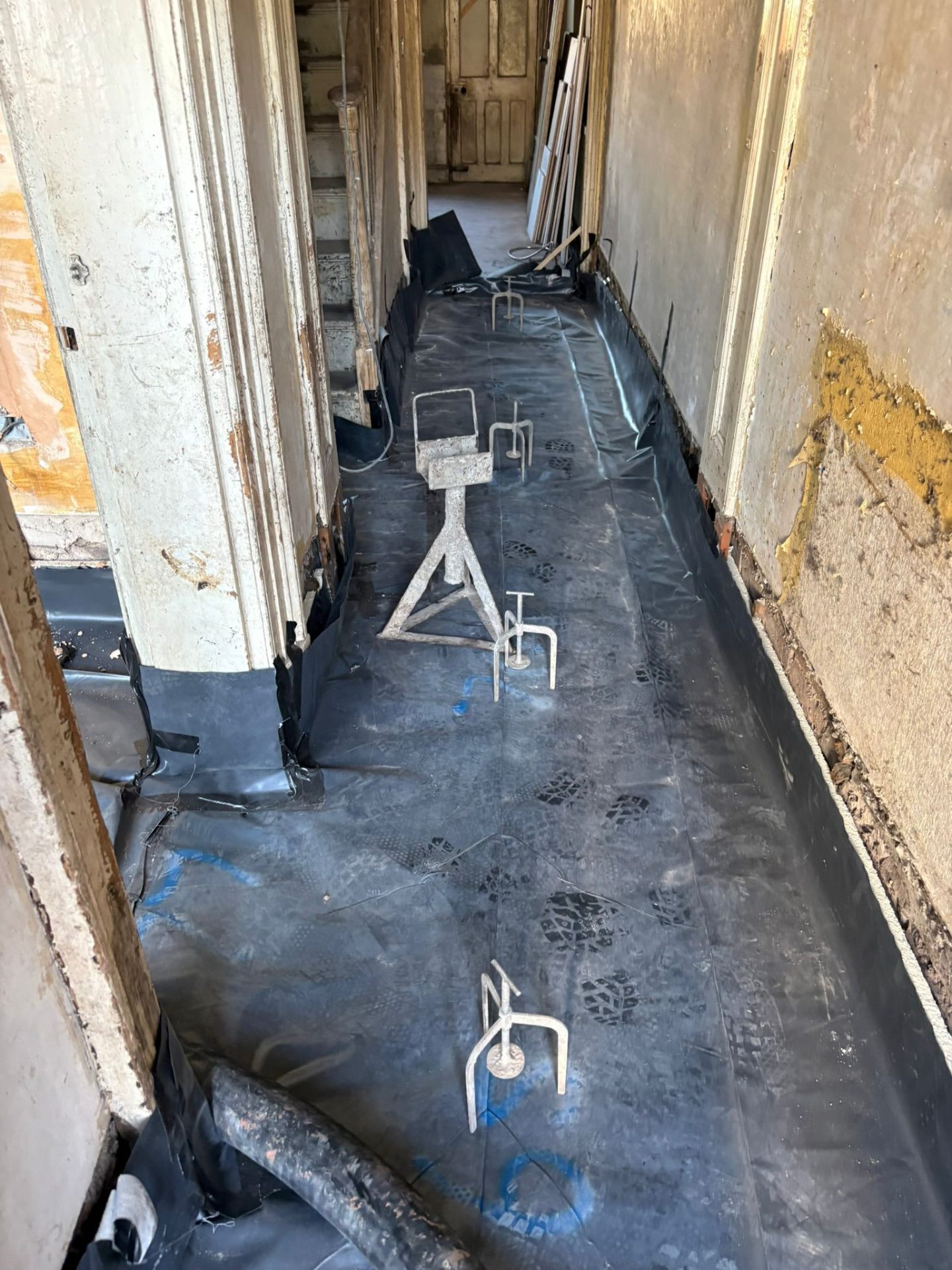 Hallway DPM and chairs ready for pumped screed